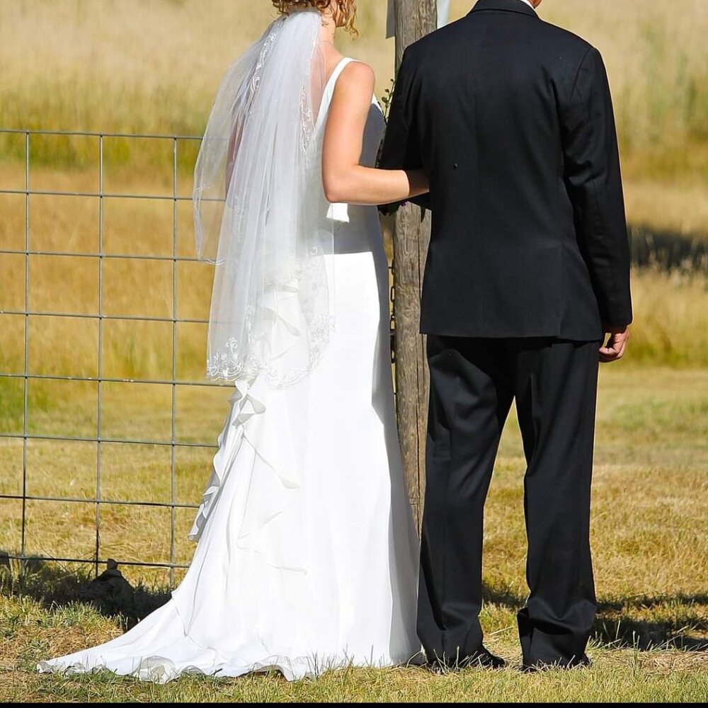 Elegant, feminine chiffon and lace wedding dress